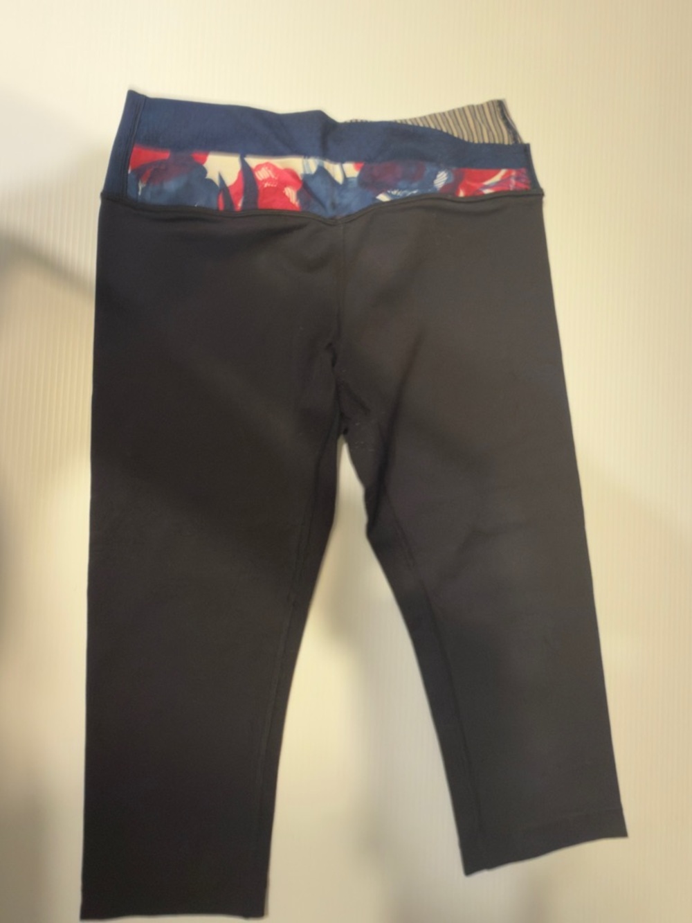 lululemon athletica Black Capri Leggings with Navy Floral Waistband